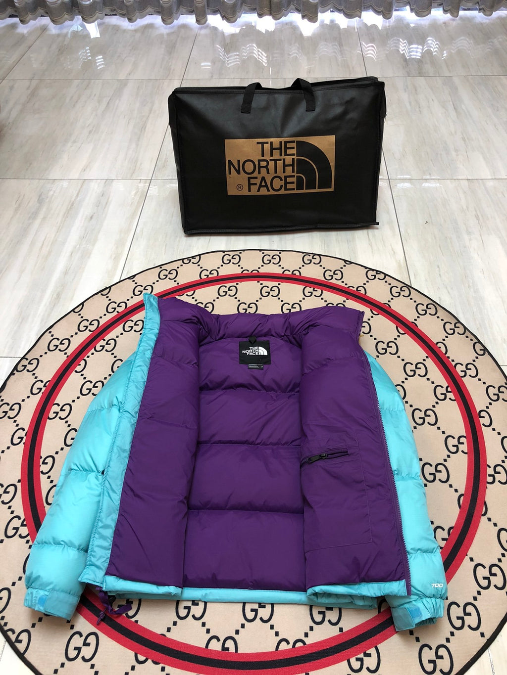The North Face Cyan Nuptse 700-Fill Down Jacket with Purple Interior