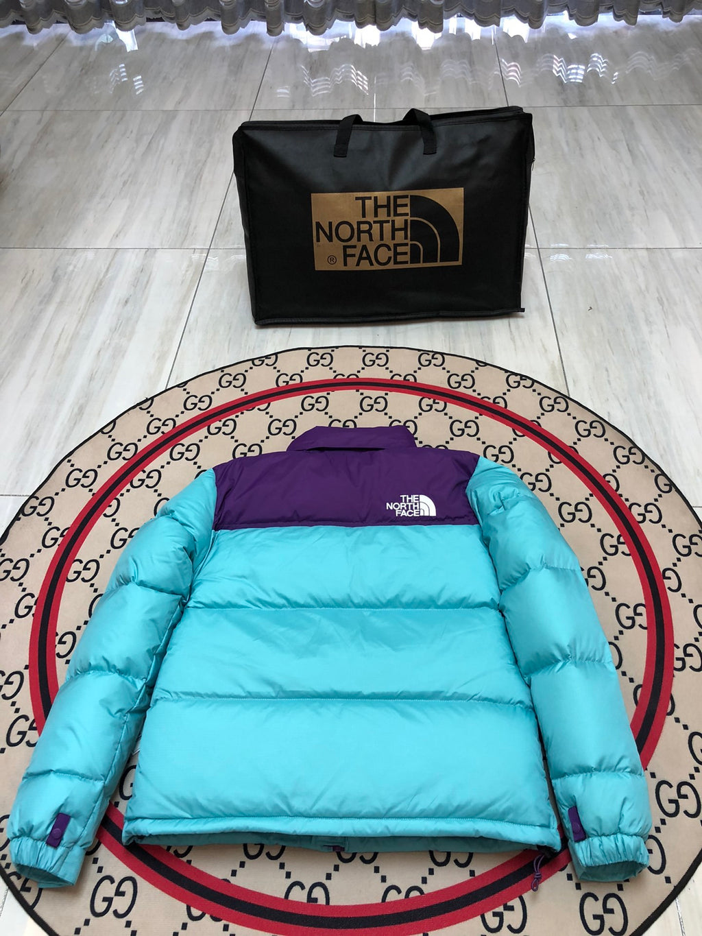 The North Face Cyan Nuptse 700-Fill Down Jacket with Purple Interior