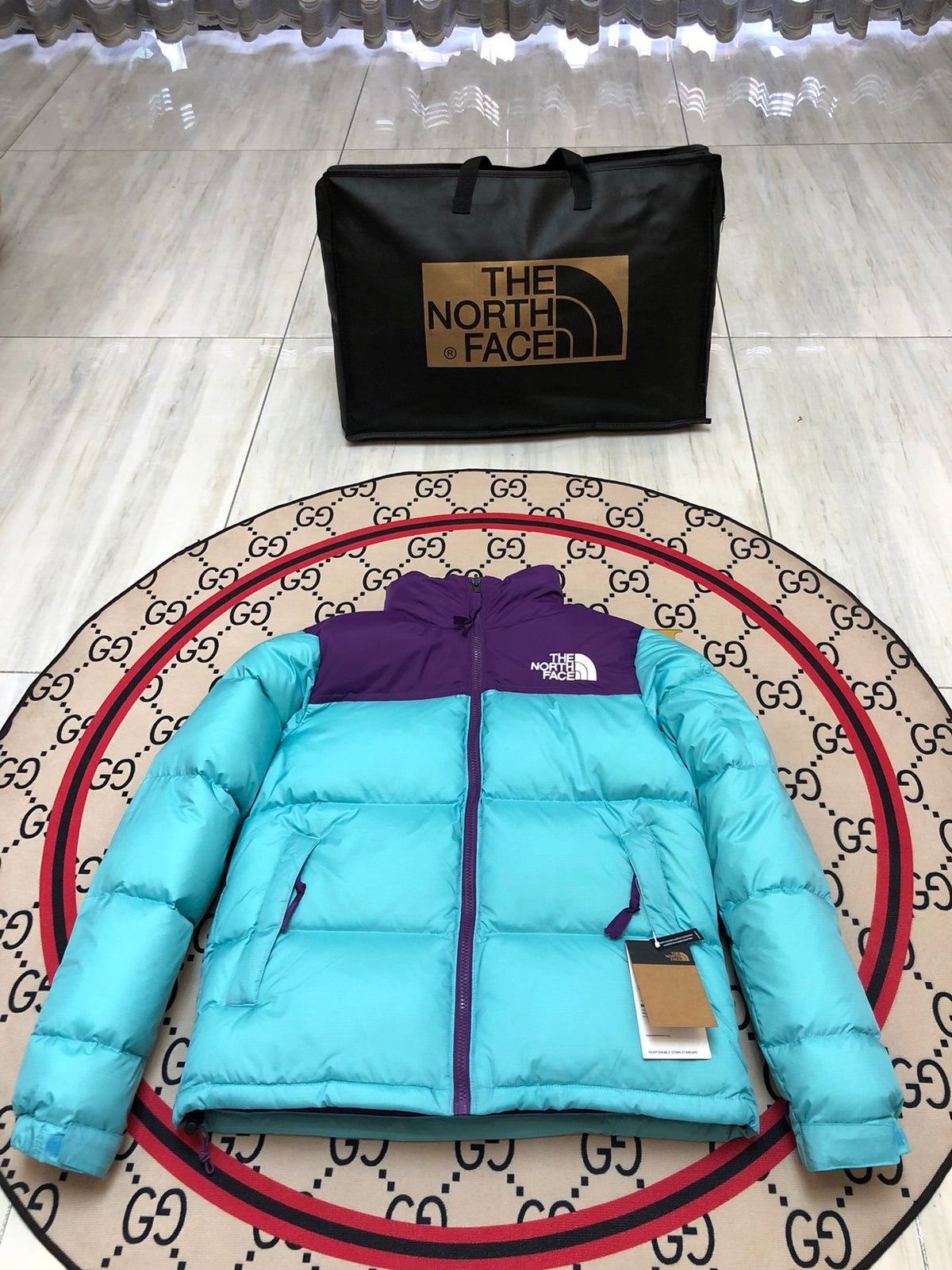 The North Face Cyan Nuptse 700-Fill Down Jacket with Purple Interior